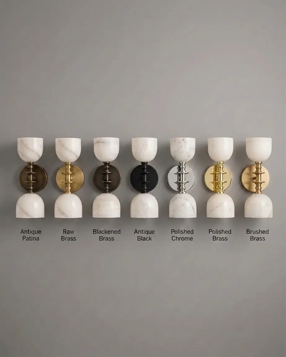 Double-goblet alabaster wall sconce shown across seven finish options