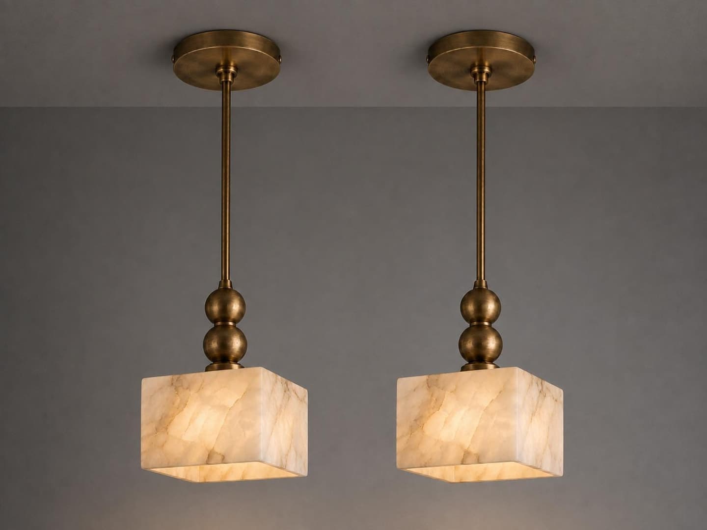 Square alabaster pendant light with brass hardware and sphere accents — image 1 of 8