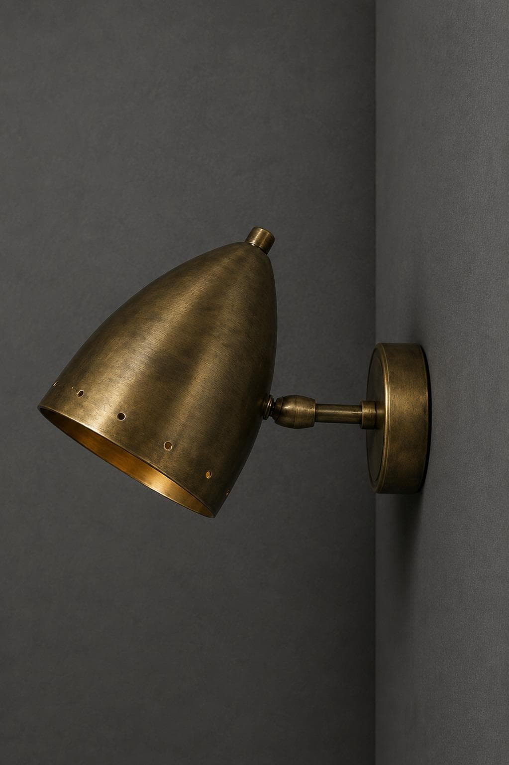 Solid brass wall sconce with adjustable cone shade — image 1 of 8