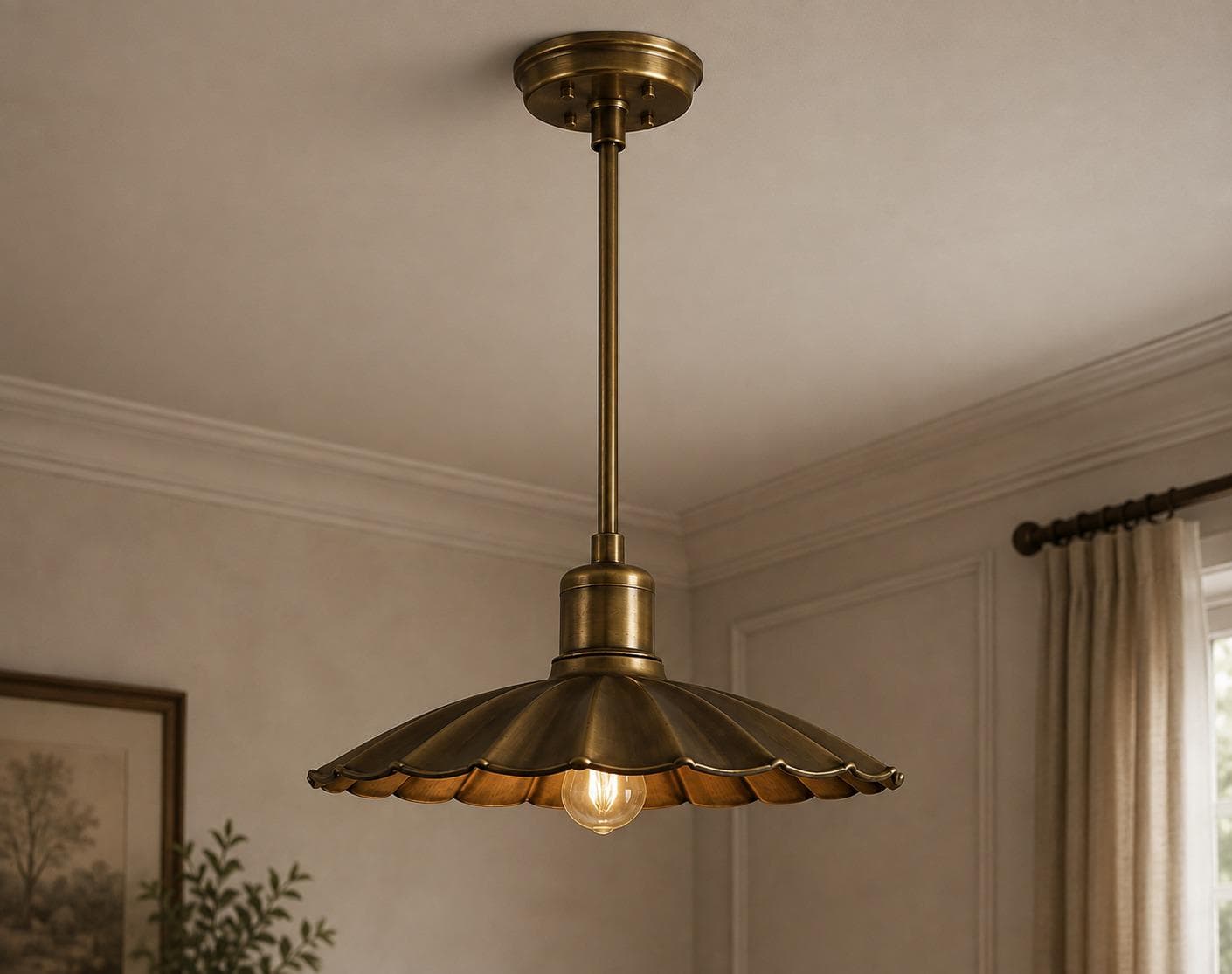 Antique brass pendant light with a wide scalloped petal shade on a slim rod, lit with an Edison bulb in a panelled room
