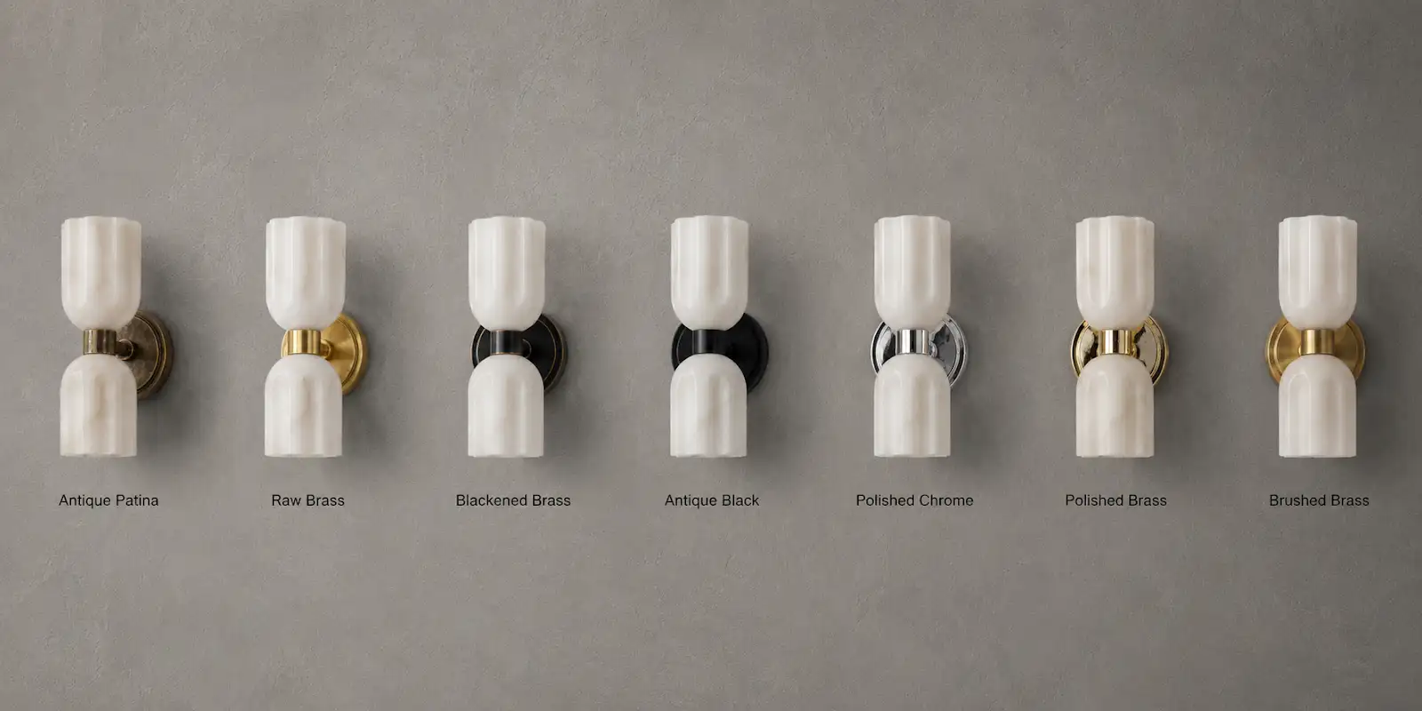 Alabaster double-globe wall sconce shown across seven finish options: Antique Patina, Raw Brass, Blackened Brass, Antique Black, Polished Chrome, Polished Brass, Brushed Brass